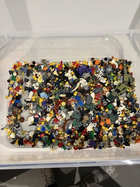 3 pounds of Lego Accessories (Pants, tops, heads, helmets, and armor)
