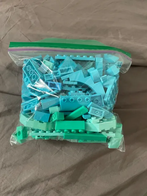 1/2 lb bag of random blue and teal lego pieces - used pieces - random pieces