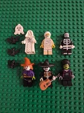 LEGO Monster minifigures theme, including a mummy, a skeleton, and a witch lot 6
