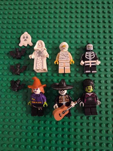 LEGO Monster minifigures theme, including a mummy, a skeleton, and a witch lot 6