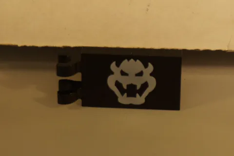 Lego New Black Tile Modified 2 x 3 w/ 2 Clips with White Bowser Head Part