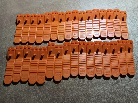 LEGO BULK LOT OF 32 ORANGE HUMAN TOOL BRICK & AXLE SEPARATOR #96874