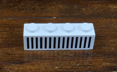 LEGO White Brick 1 x 4 with Black Grille with 20 Vertical Lines Pattern