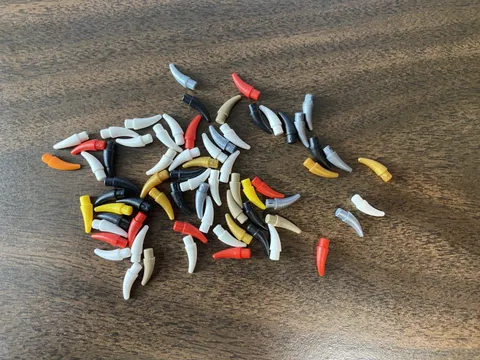 LEGO Bulk Parts: Lot of 65, 53451 Barb / Claw / Horn / Tooth - Small