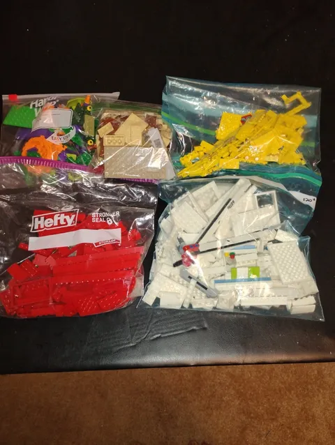 2 pounds of lego pieces - random pieces Red, Yellow, White, Tan Partially Dorted