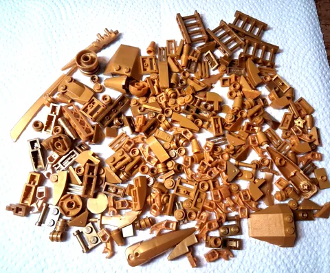 A Lego Lot 271 Assorted Gold Pieces Slopes Tiles Specialty Modified Parts