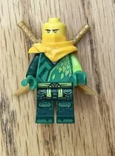 LEGO Green ninja Ninjago Lloyd Minifigure w/ 2 Gold Swords & 2 Faces Mini Figure