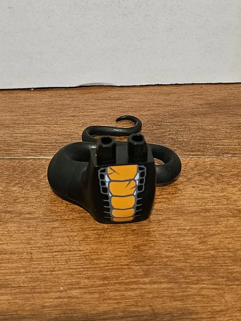 LEGO - Minifig, Lower Body with Tail, Orange Scales Pattern - Black (Skalidor)