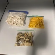 White, Yellow, And Tan Lego Pieces
