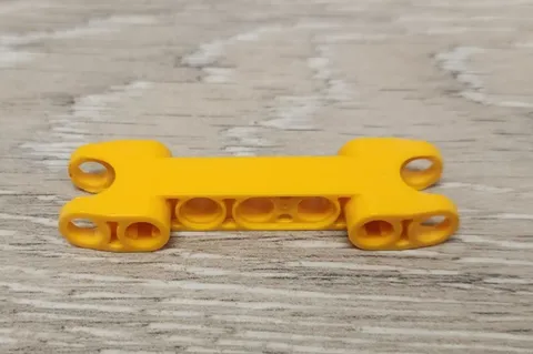Lego 50898 Bright Light Orange Technic Axle and Pin Connector 2x7 2 Ball Sockets