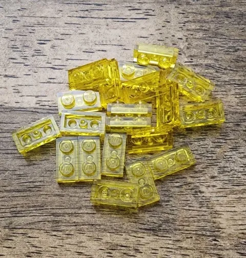 LEGO Trans Yellow Plate 1 X 2 QTY 20. Part No. 3023.