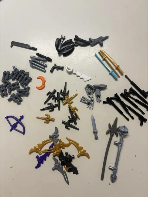 Lego  Bulk 50 + Weapons Assorted Medieval Guns Blades As Shown