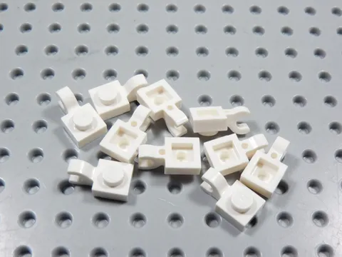 LEGO Lot of 10 White 1x1 Modified Plates w/ Horizontal Clip on End BH