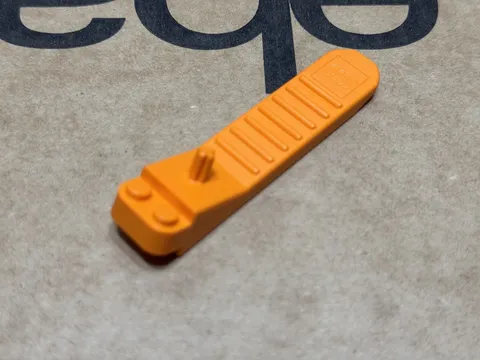 LEGO Parts - Orange Brick and Axle Separator - No 96874 - QTY 1