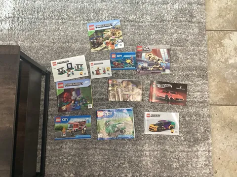 Collection of 11 LEGO and Mega Construction Manuals