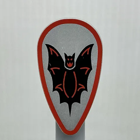 LEGO Castle Part 2586p4f Oval Shield Black Bat Red Border Silver Background