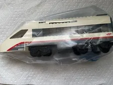 Miscellaneous Lego pieces with train, car and a plane