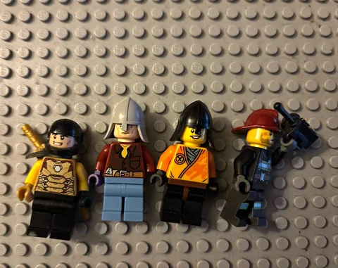 LEGO Minifigures Lot of 4 w/ Accessories Helmet Red Cap Weapon