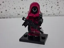 Squid Game Pink CircleGuard Custom Lego Minifigure  With Black Stand 