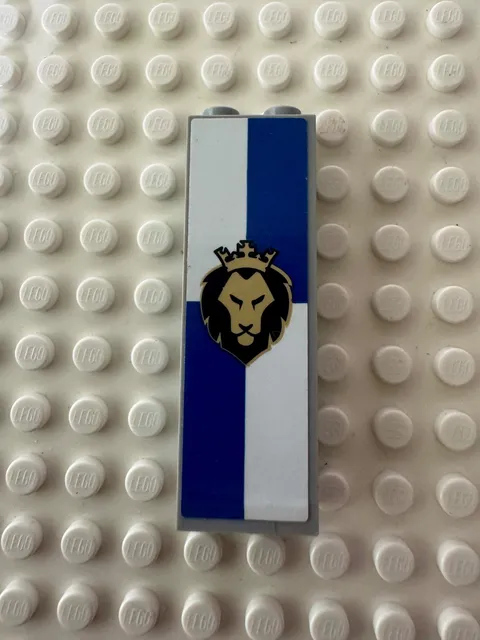 LEGO Brick 1 x 2 x 5 with Black and Gold Lion Head with Crown 2454pb220