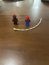 lego spiderman and miles morales minifigures and web