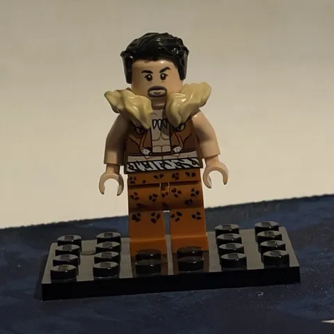 LEGO Plastic Minifigure with Fur Collar, Black Hair, Brown Outfit