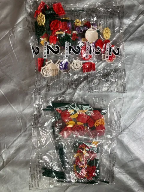 2 SEALED BAGS of Legos Green Red Cream Blue yellow Purple