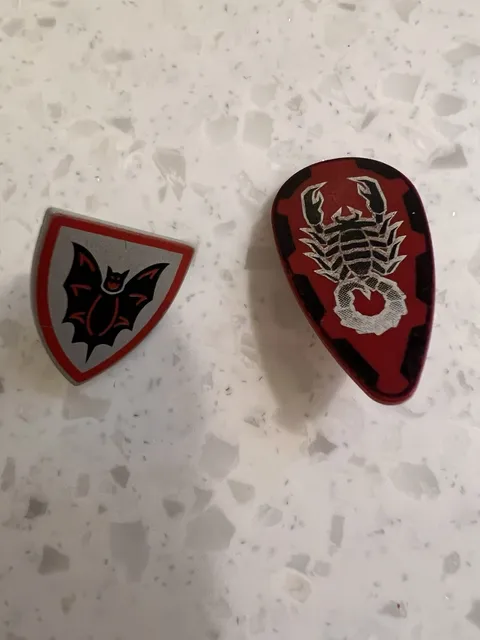 Lot Of 2 LEGO Castle Shield Oval with Black Bat and Red Border on Silver Back