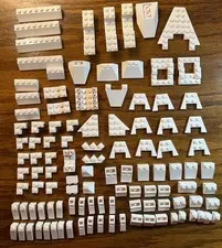 Lego lot of 110 assorted WHITE slopes, chassis bases, brackets, wedges, etc.