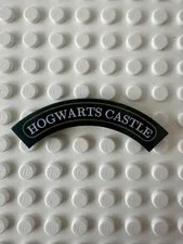 LEGO Tile, Round Corner 4 x 4 Macaroni with 'HOGWARTS CASTLE' 27507pb01