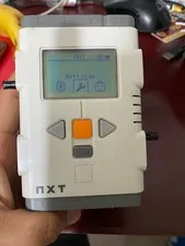 Original LEGO NXT 9797 controller. No batteries included. Function is normal.