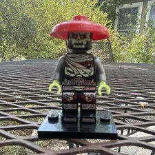 LEGO Skeleton Warrior Minifigure w/ Red Hat & Black Display Base