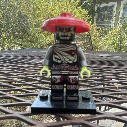 LEGO Skeleton Warrior Minifigure w/ Red Hat & Black Display Base