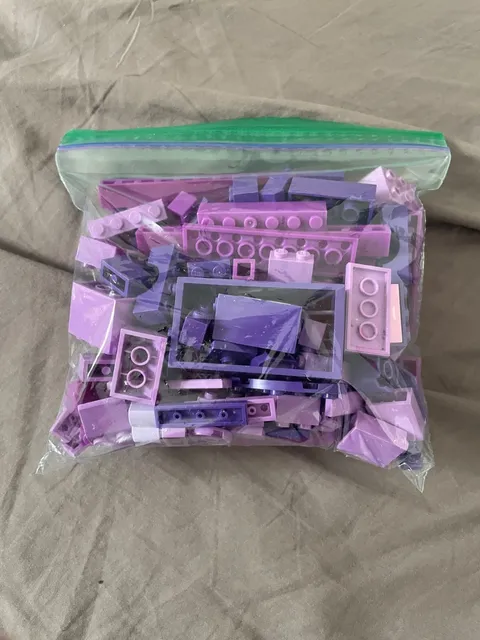 1/2 lb bag of random purple lego pieces - used pieces - random pieces