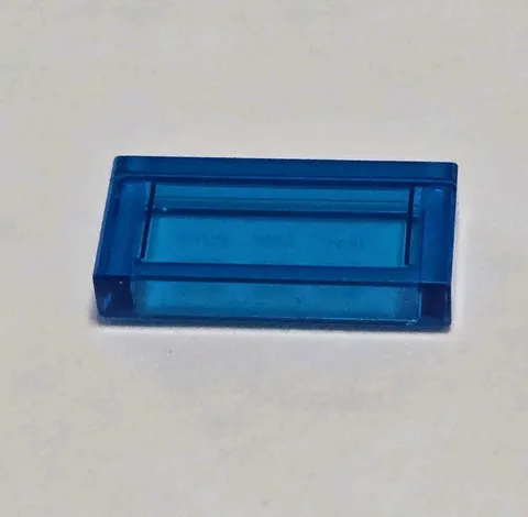 LEGO Parts - Trans-Light Blue Tile 1 x 2 - No 3069
