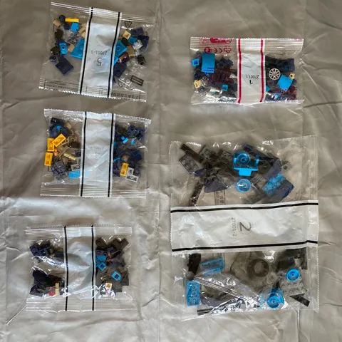5 SEALED BAGS of Legos Black yellow Blue Gray