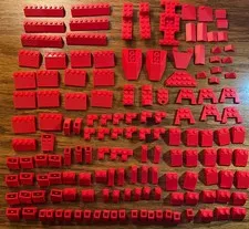 Lego lot of 147 assorted RED slopes, chassis bases, brackets, wedges, etc.