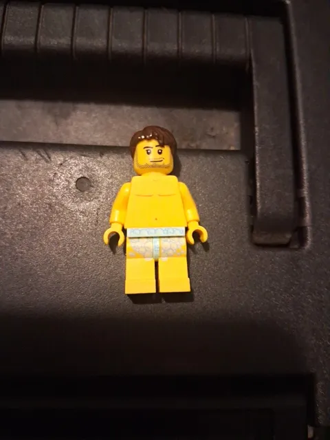 LEGO Minifigure Female, Brown Hair, Yellow Skin, Swimsuit Trunks, Yellow Top