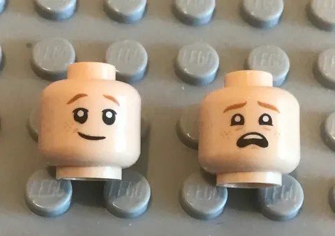 LEGO One 2 Sided Light Nougat Flesh Minifig Head, Cocky Grin and Scared or Upset