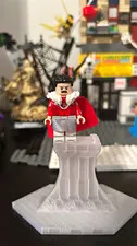 LEGO Minifigure Red Cape White Fur Collar Gray Outfit Black Hair Display Stand