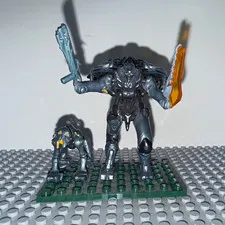 Halo, mega blocks three gray aliens, big alien has two of the same leg ￼