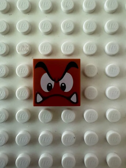 LEGO Tile 2x2 w Black Eyebrows Dark Brown and White Eyes Looking Down 3068pb1373
