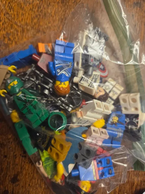 bag of random lego figures and parts