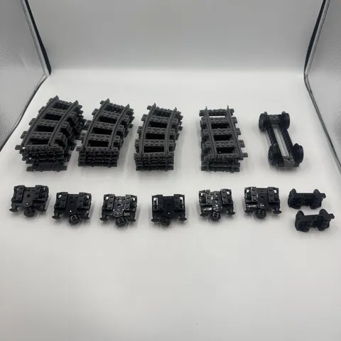 20 pieces Lego Train Track Lot: 16 Curved 4 Straight With 9 Sets Of Wheels