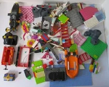 Mixed Lot of LEGO Pieces Including Boat, Raft, Canon and More Weighs 3 1/2" Lbs.