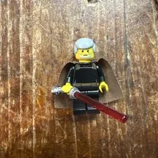 Lego Count Dooku Yellow with Chrome Lightsaber.  Brand new condition!