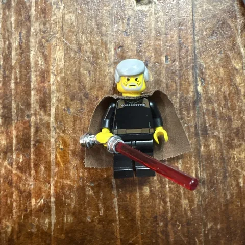 Lego Count Dooku Yellow with Chrome Lightsaber.  Brand new condition!