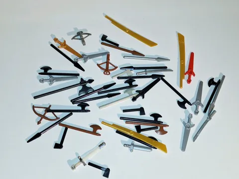 Lego Weapon Assortment X 43p.  Excellent Used Condition. No Original Packaging.