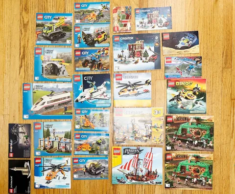 Lot of 27 LEGO Instruction Booklets City Exosuit Pirates Hobbit Dino, and More