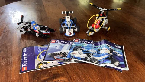 Lot of 3 LEGO Technic vehicle sets, vintage 1990s w/ Instructions.